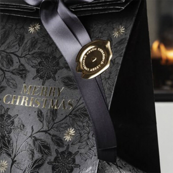 Gift wrap, gift bag, BlackMagic Forrest, embossed Merry Christmas, black, detail